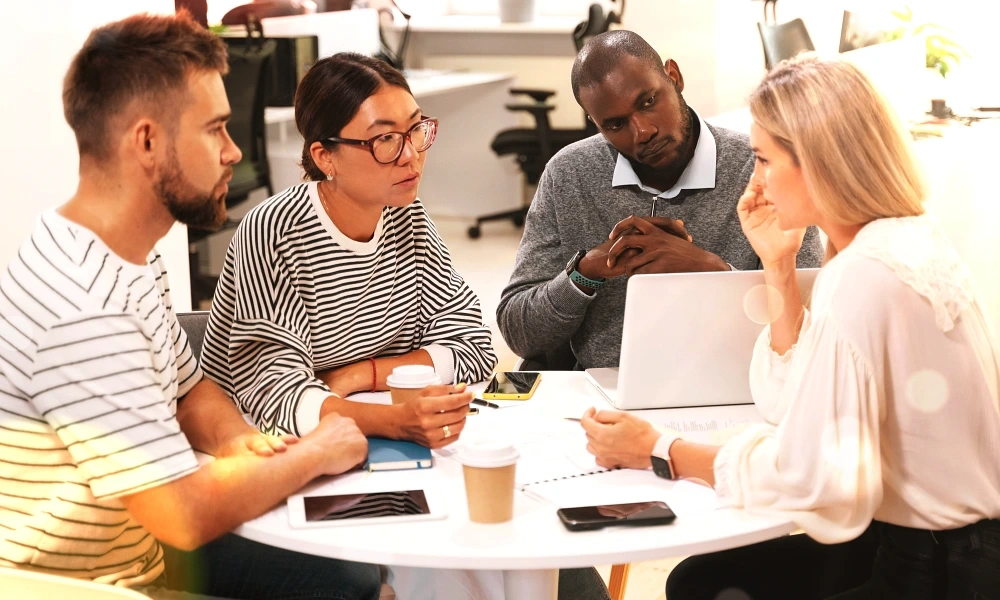 gdp-training-products-GDP-for-RPs-and-Management-colleagues-around-table-discussing
