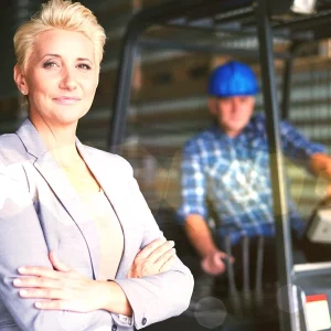 gdp-training-products-responsible-person-for-import-rpi-woman-posing-warehouse-with-forklift-truck-driver