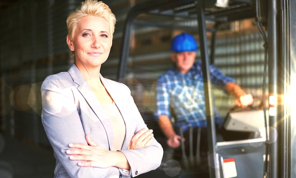 gdp-training-products-responsible-person-for-import-rpi-woman-posing-warehouse-with-forklift-truck-driver